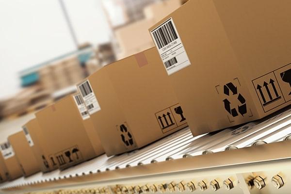 Cardboard boxes on a production line in a packaging warehouse