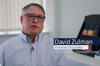 A screenshot of a video of David Zulman of Firetree Chocolate talking about receiving a MEIF loan