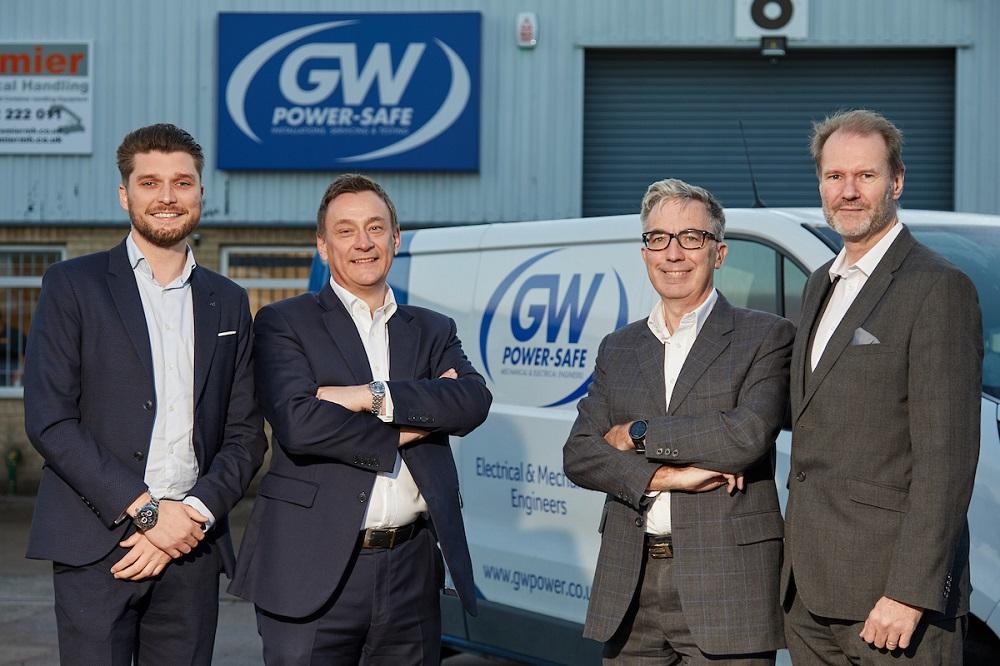 4 men in suits stood outside of the GW Power Safe office building