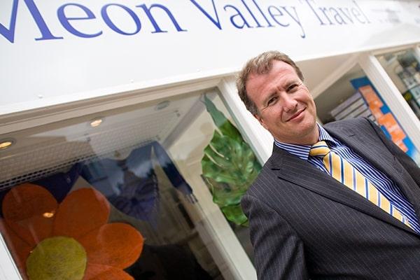 James Beagrie, managing director of Meon Valley Travel, standing outside his business premises