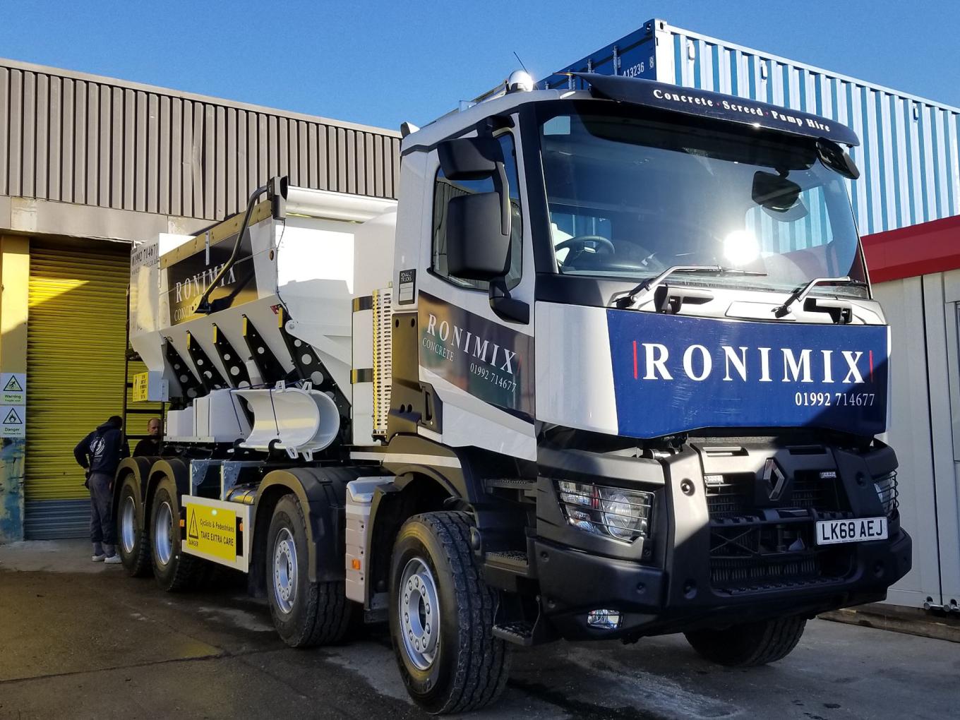 A Ronimix branded concrete pump truck