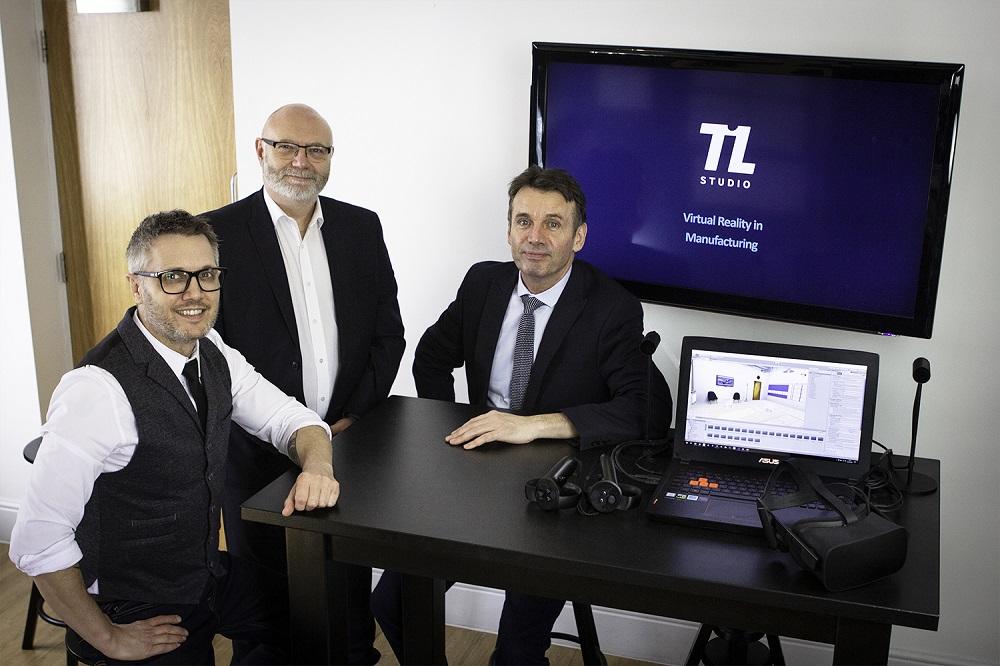 Three men in suits from The Immersive Learning Studio sat beside their recording equipment