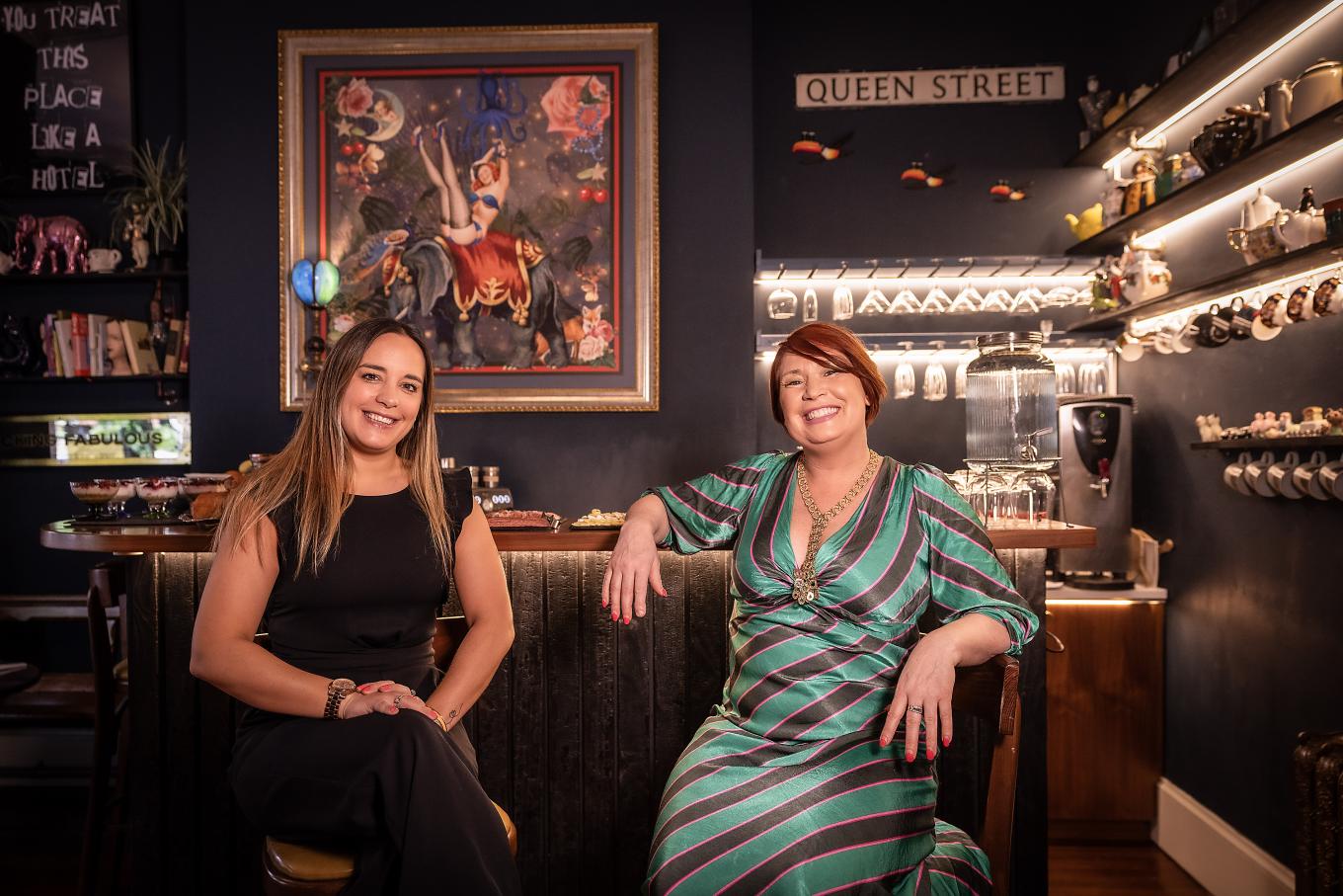 A photo of Harrison Chambers of Distinction owner Melanie Harrison and Clare Stokes from Whiterock sitting at the bar in the hotel