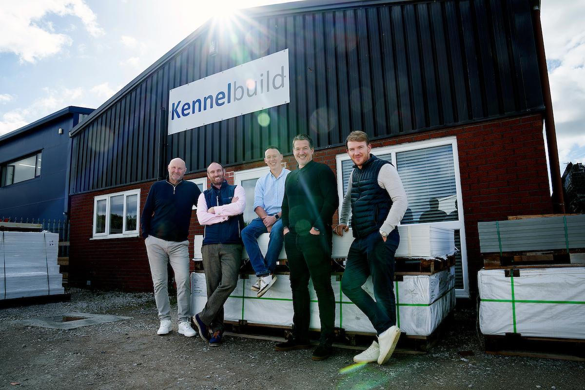 Group of 5 people standing outside the Kennelbuild warehouse