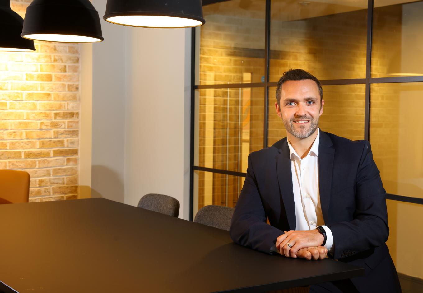 Image of  person sitting in the meeting room