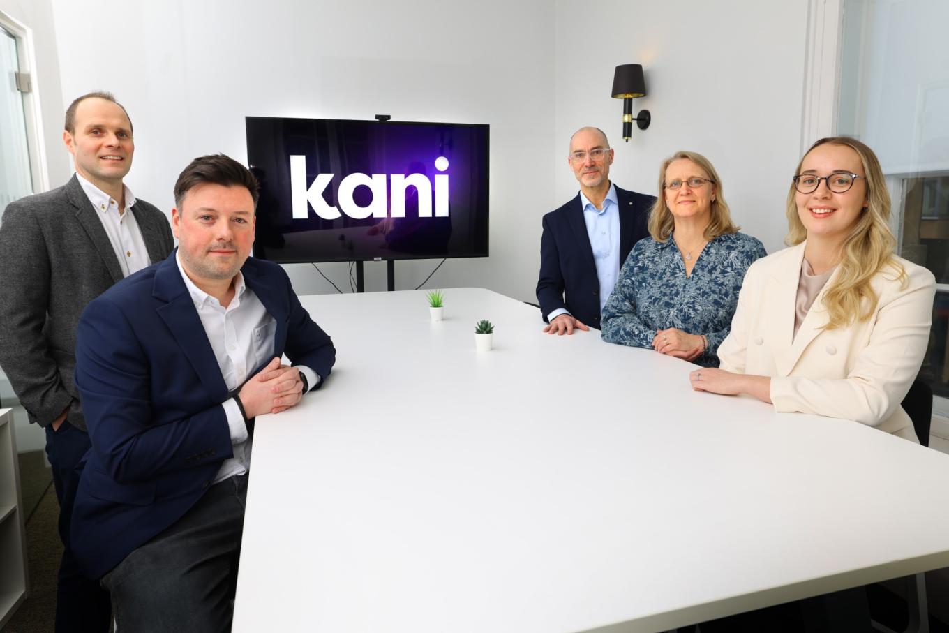 image of kani payments team sitting together