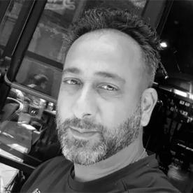 Relaxed portrait shot of Suneet Kapoor
