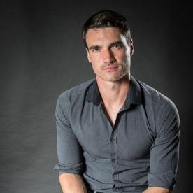 Portrait photograph of Luke Stott