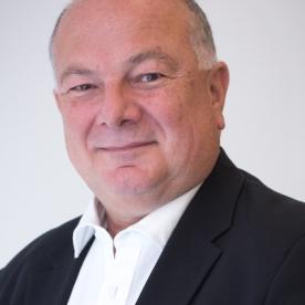 Headshot image of Tim Farazmand